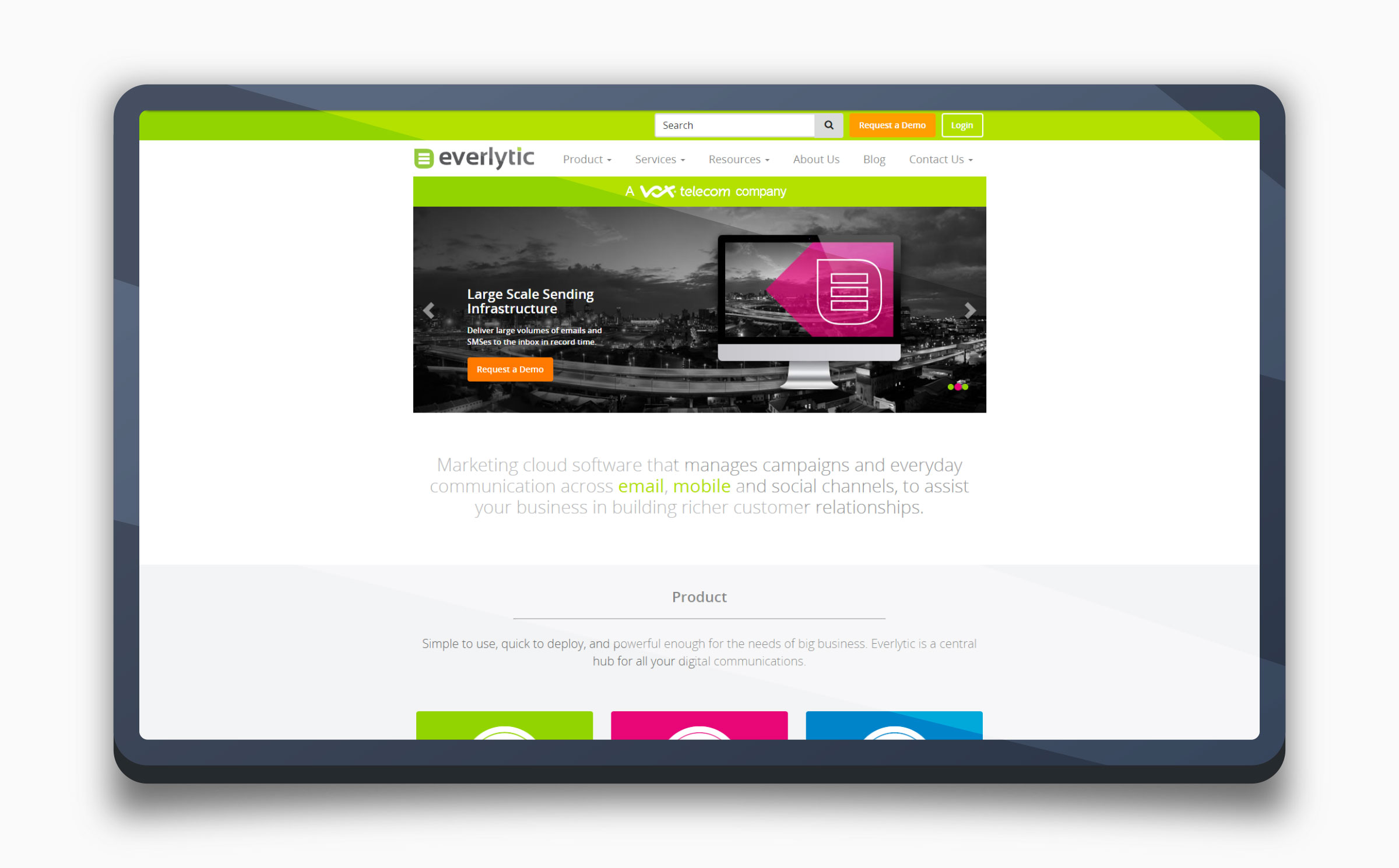 The interim Everlytic website on a tablet — a lime green header with "A Vox telecom company" banner and a black-and-white cityscape hero